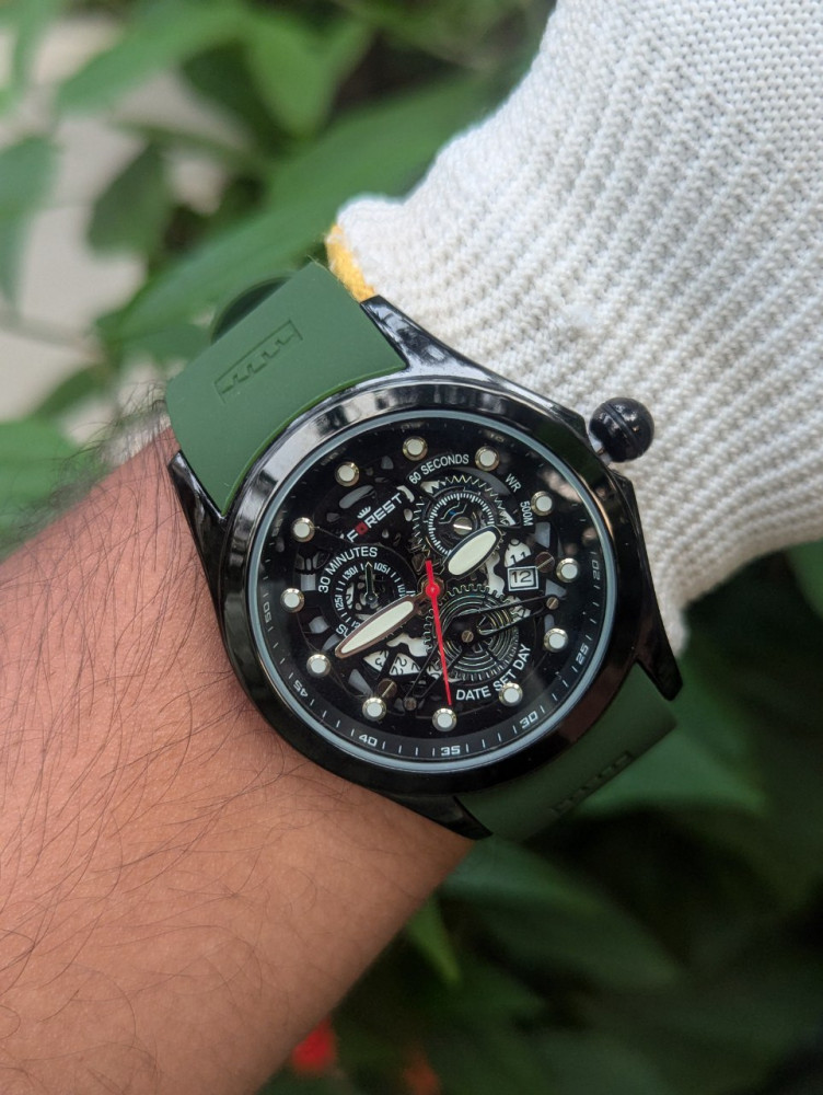 Embrace natural elegance with the Forest Metal Case Analog Watch