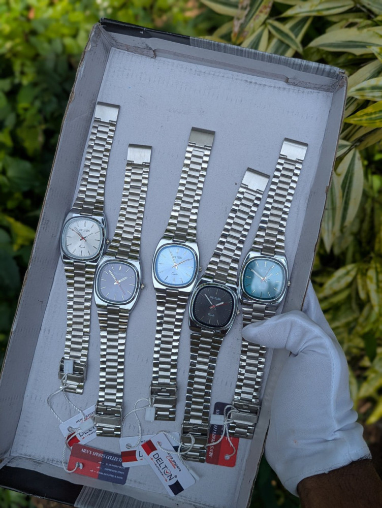 ✨ Elevate your wrist game with the Delton Premium Analog Chain Watch! ✨