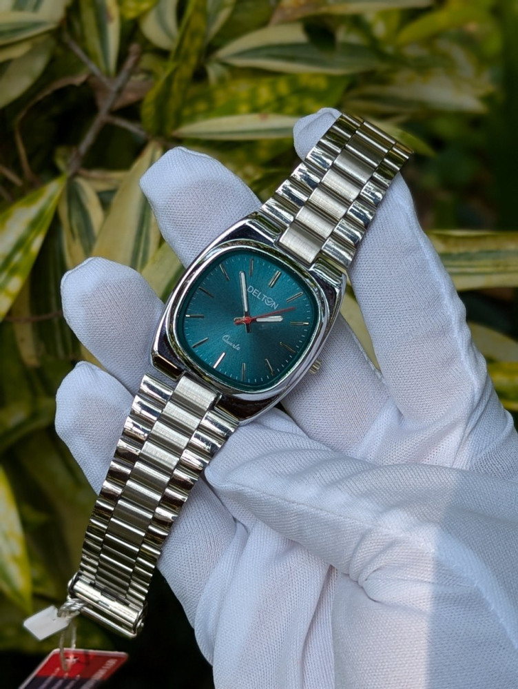 ✨ Elevate your wrist game with the Delton Premium Analog Chain Watch! ✨