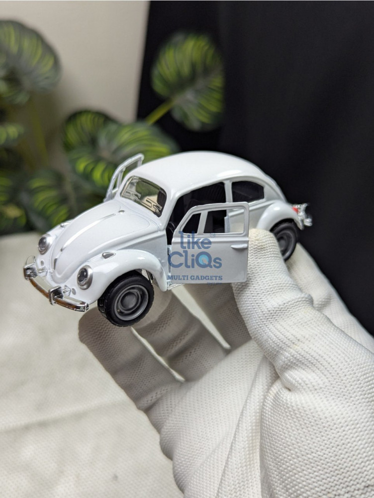 Cruise in classic style with this Volkswagen Beetle vintage 1:43 Scale metal car