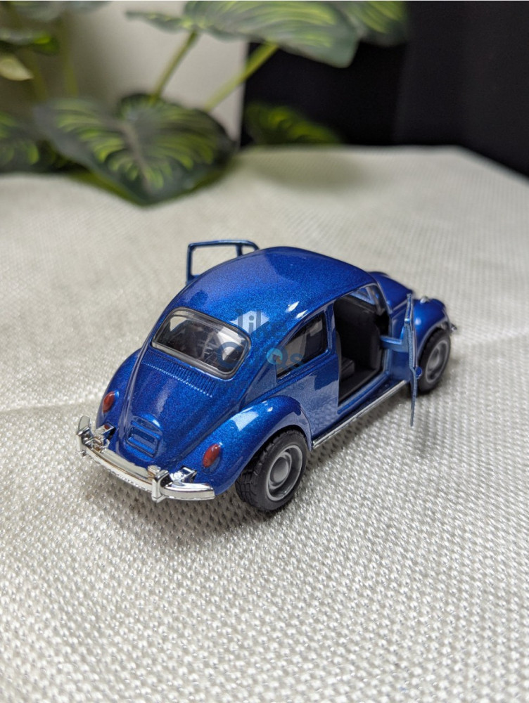 Cruise in classic style with this Volkswagen Beetle vintage 1:43 Scale metal car