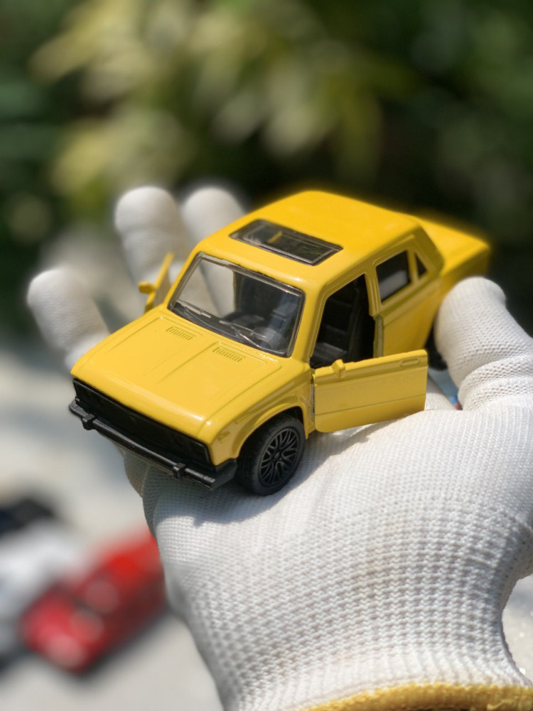Add a touch of vintage charm with this 1:32 Scale Lada metal miniature