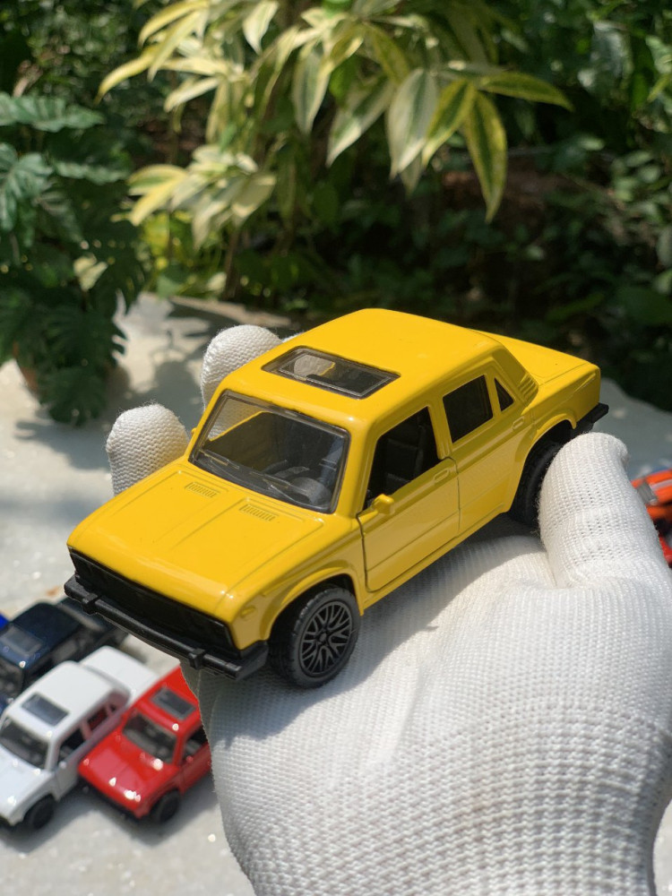 Add a touch of vintage charm with this 1:32 Scale Lada metal miniature