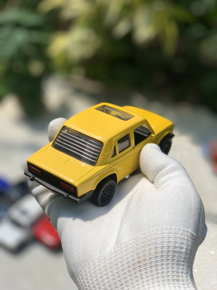 Add a touch of vintage charm with this 1:32 Scale Lada metal miniature