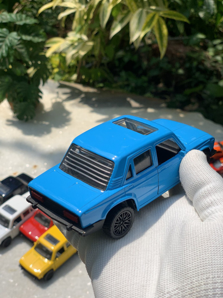 Add a touch of vintage charm with this 1:32 Scale Lada metal miniature