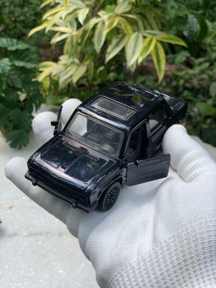 Add a touch of vintage charm with this 1:32 Scale Lada metal miniature