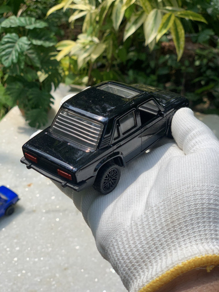 Add a touch of vintage charm with this 1:32 Scale Lada metal miniature