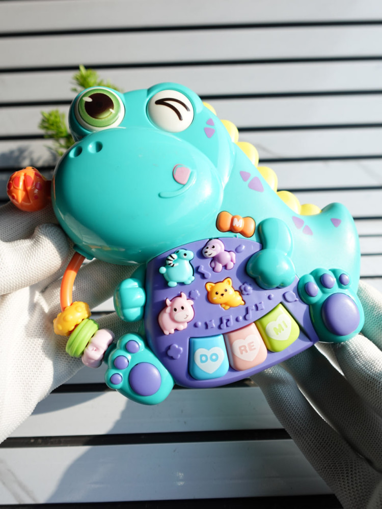 Musical Dinosaur Learning Toy – Sensory Rattle & Piano for Early Brain Development