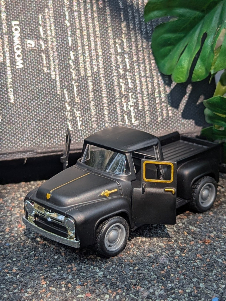 Cruise in retro style with this diecast Ford F100
