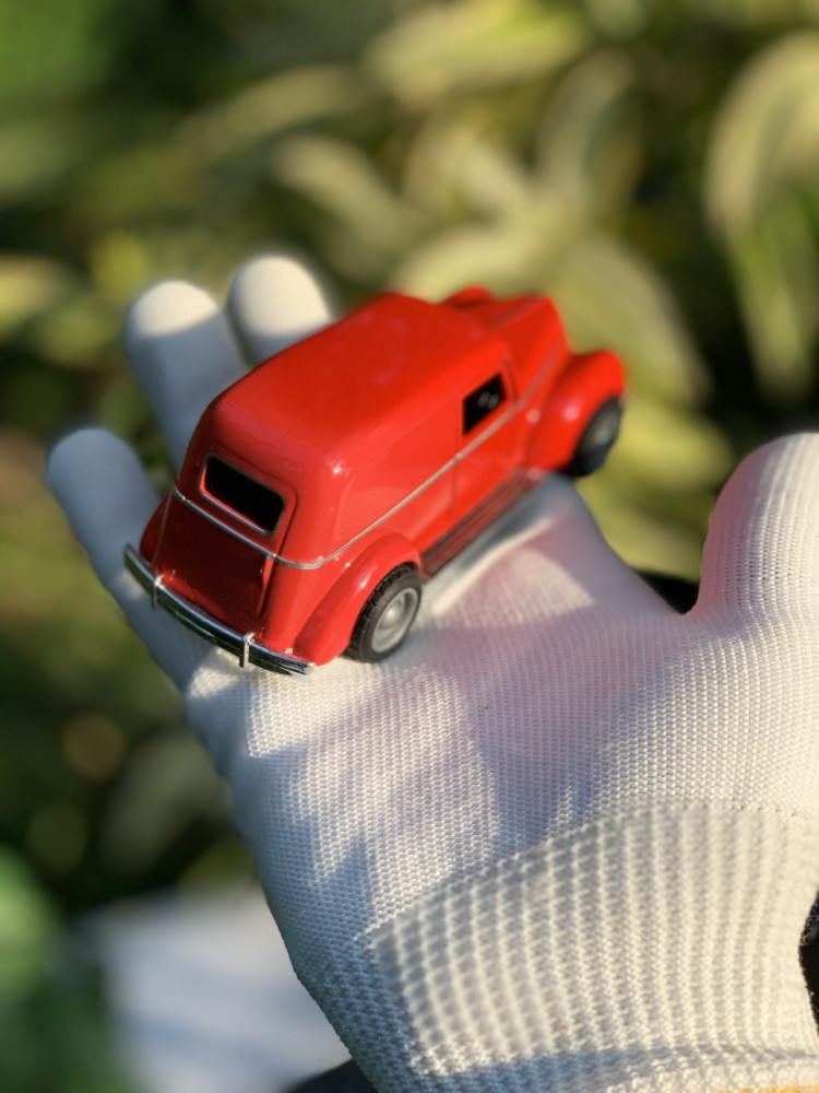 Step back in time with this 1:43 scale Ford sedan delivery Vintage metal car
