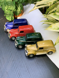 Step back in time with this 1:43 scale Ford sedan delivery Vintage metal car