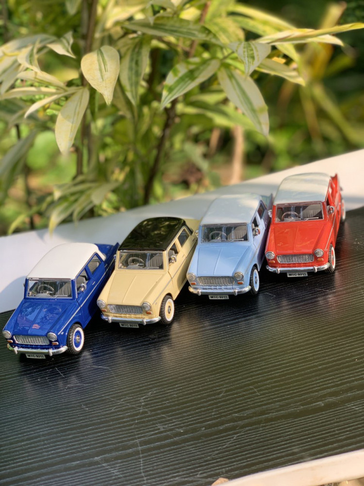 Zoom into nostalgia with these adorable Fiber Premier Padmini vintage classic car miniatures