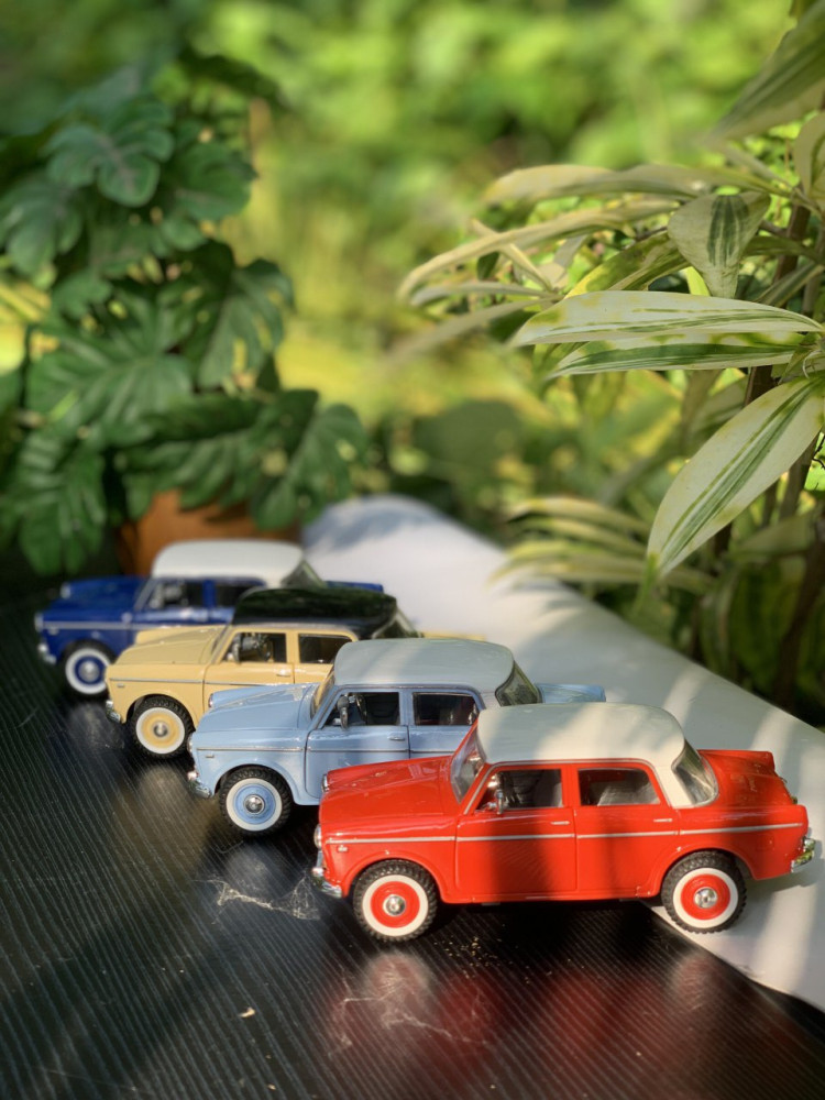 Zoom into nostalgia with these adorable Fiber Premier Padmini vintage classic car miniatures