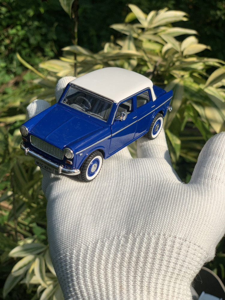 Zoom into nostalgia with these adorable Fiber Premier Padmini vintage classic car miniatures