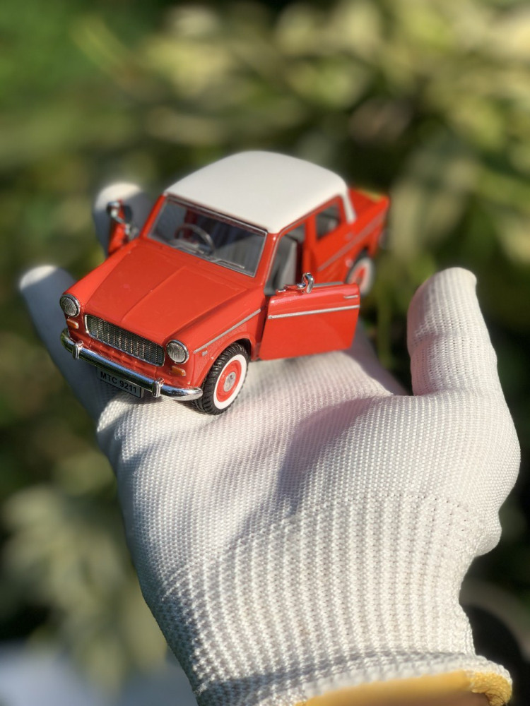 Zoom into nostalgia with these adorable Fiber Premier Padmini vintage classic car miniatures