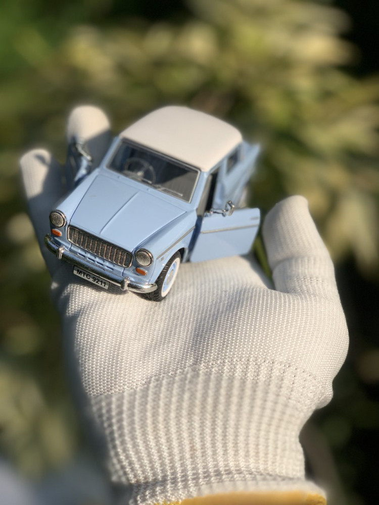Zoom into nostalgia with these adorable Fiber Premier Padmini vintage classic car miniatures